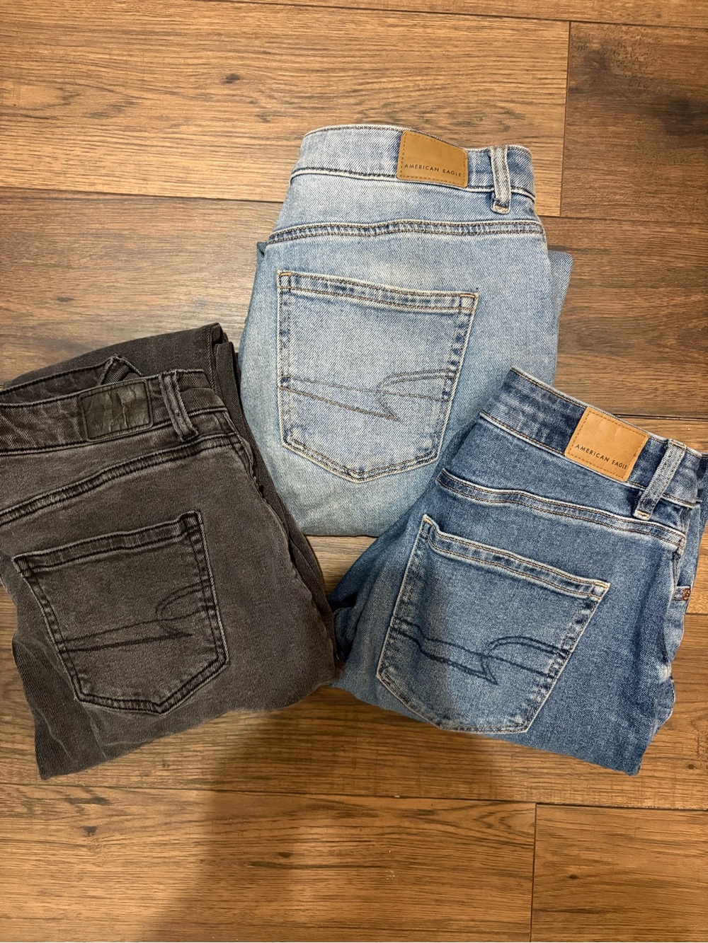 American Eagle Outfitters Jeans Trio - Light Blue, Medium Blue, Charcoal